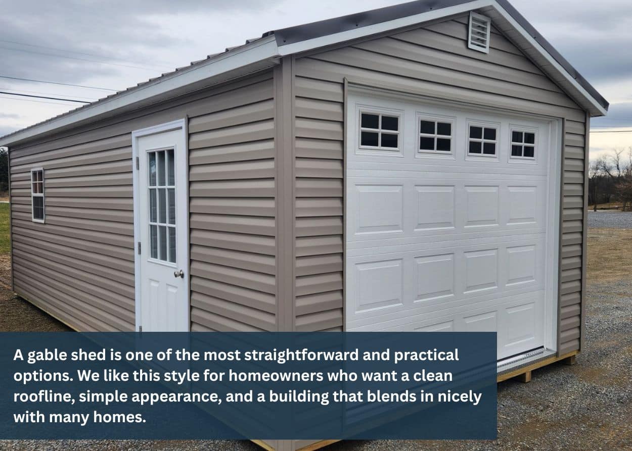 Vinyl-sided 12x24 gable shed with garage door and entry door illustrating a practical multi-use shed style.