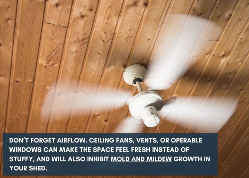 white ceiling fan spinning on a wood ceiling