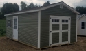 Gable building, custom siding color, with transom doors in Butler, PA