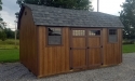Wood stained siding, Estate Gray shingle roof, 12x16 highwall portable building in Cochranton