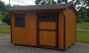8 x 12 Saltbox barn, cedar stain with Dark Brown trim, Brownwood shingles, transom doors Cochranton Pa